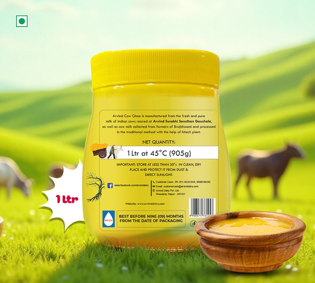 Product photo: 1-liter yellow ghee bottle on grass with a wooden bowl of ghee in front; cows grazing in a blurred countryside background.