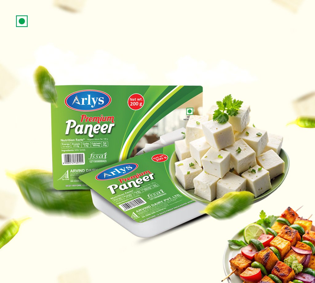 Arlys Premium Paneer packaging with a plate of cubed paneer and herbs nearby.