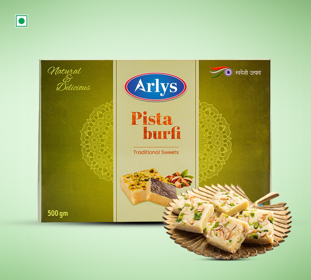 Arlys Pista Burfi box with traditional sweets design, pistachio fudge pieces displayed on a decorative plate in front.