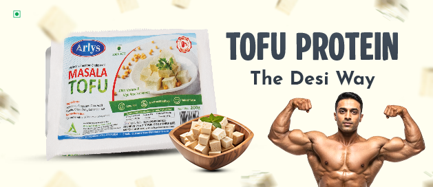 Promotional image for tofu protein showing Arlys Masala Tofu package, a bowl of tofu cubes, and a muscular man flexing next to the text “TOFU PROTEIN The Desi Way.”
